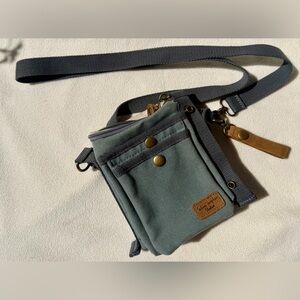 Selina Vaughan studios canvas cross body with handmade, detailed patch work.